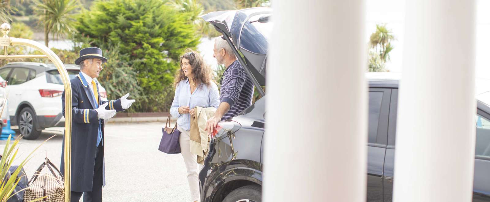 Royal Duchy Hotel Arriving Guests Greeted by Doorman Near Their Car