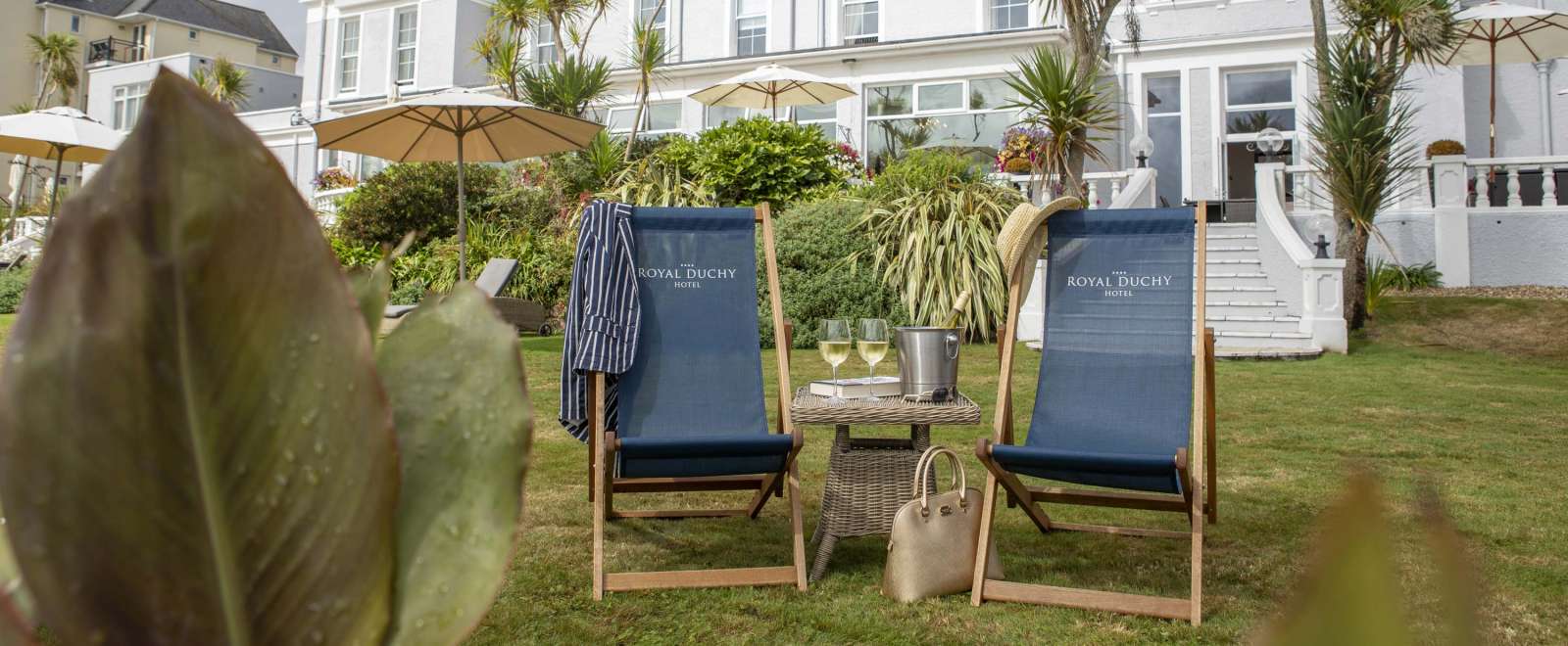 Royal Duchy Hotel External View with Deck Chairs and Wine