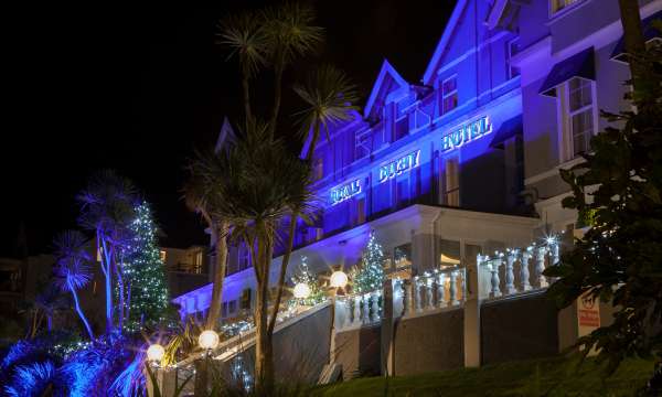 Night time picture of The Royal Duchy Hotel at Christmas
