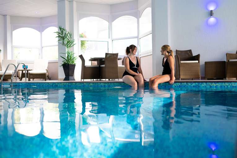 Two ladies in the pool at The Royal Duchy Hotel