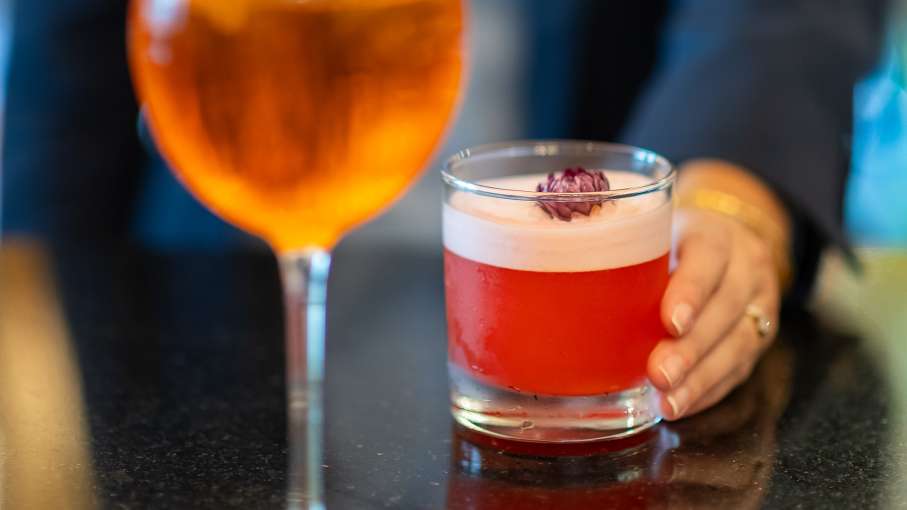 Lady making cocktails at The Royal Duchy Hotel Bar