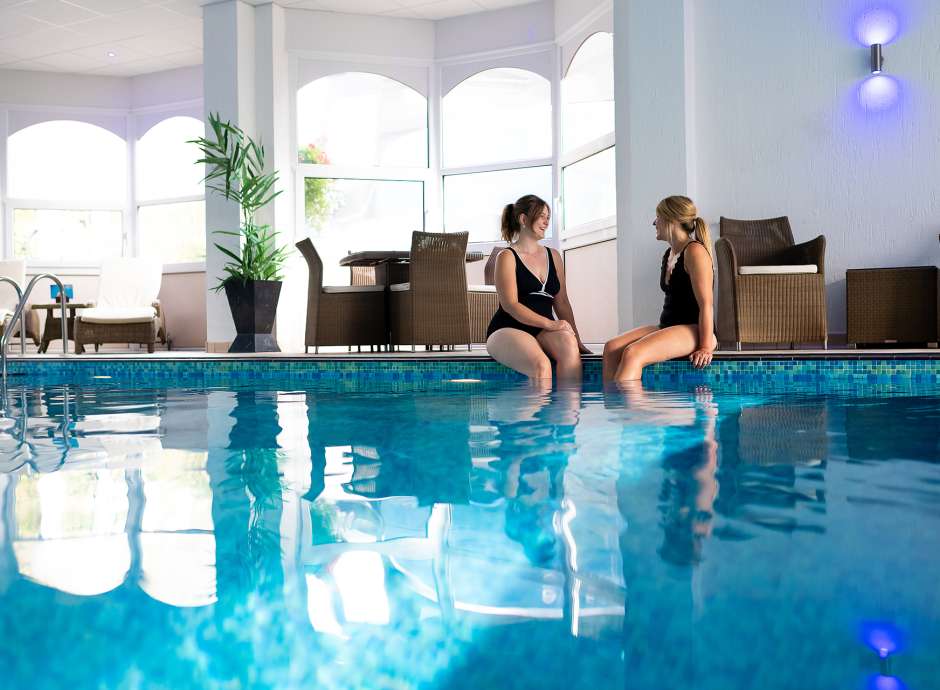 Two ladies in the pool at The Royal Duchy Hotel